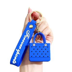 Blue EVA mini beach bag keychain with Forever Sports wristlet and golden metal clip