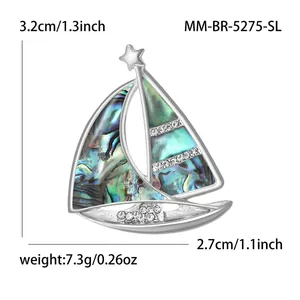 Natural abalone shell sailboat brooch with rhinestones measuring 3.2cm by 2.7cm