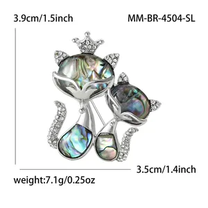 Silver alloy cat brooch with iridescent shell inlay and sparkling rhinestones for coats