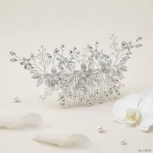 Exquisite bridal hair comb with pearls, rhinestones, and silver leaf branches for weddings