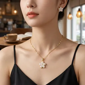 Elegant rotating pearl flower necklace and earrings set in titanium steel for women
