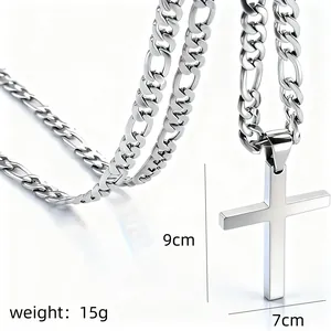 Detail view of large stainless steel cross pendant measuring 9cm by 7cm on Figaro chain
