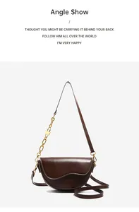 Macro detail of dark brown saddle bag featuring wave-edge lid and gold chain hardware