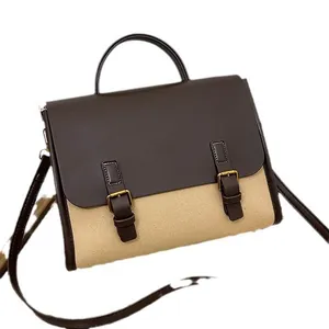 Retro two-tone messenger bag with brown leather flap and beige canvas body