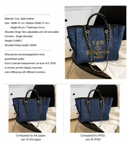 Detailansicht einer blauen Denim-Tasche mit Kettenriemen für A4-Ordner und iPad