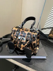 Leopard print mini trapeze handbag with creative dog face metal lock and crossbody strap