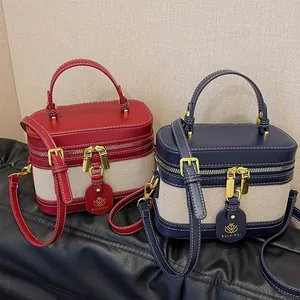 Borsa a tracolla retrò bicolore con doppie cerniere in metallo e cinturino in pelle