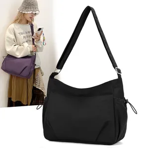 Black and purple lightweight nylon crossbody bags with multi-pockets and adjustable straps