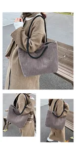 Détail du sac cabas en velours côtelé gris avec anses en corde tressée noire et œillets