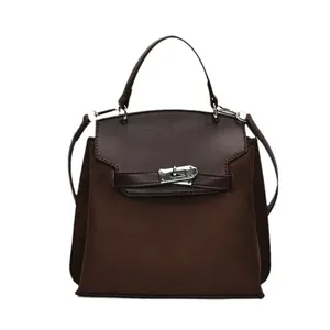 Dark brown retro kelly style handbag with matte suede panel and silver twist lock closure