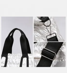Detailed macro view of white quilted gym bag showing fine stitching and metal buckles