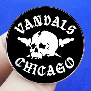 Biker club metal badge with skull and daggers featuring Vandals Chicago text logo