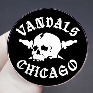 Vandals Chicago biker metal brooch featuring a skull and crossed swords design