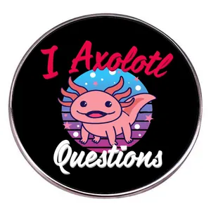Cartoon pink axolotl anatomy pin with I Axolotl Questions text on a black background