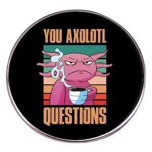 Round pink axolotl anatomy pin with vintage sunset and 'You Axolotl Questions' text