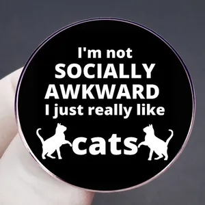 Round black enamel cat pin featuring I'm not SOCIALLY AWKWARD I just really like cats text