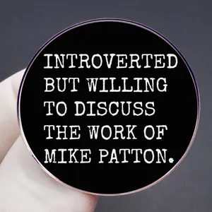 Introverted but willing to discuss Mike enamel pin with black round metal badge design
