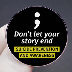 Mental health awareness brooch pin featuring a semicolon and Don't let your story end text