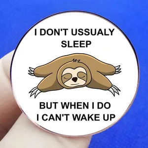 Cartoon sloth enamel pin with humorous text displayed on a blue textured background