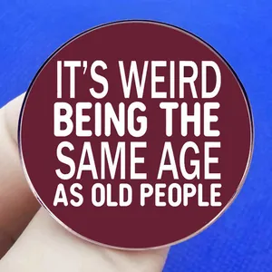 Round acrylic pin with It's Weird Being The Same Age As Old People humor quote