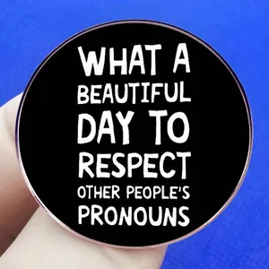 Enamel pin with Respect Other People's Pronouns message on black metal badge