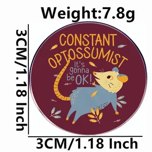 Cartoon opossum enamel pin with inspirational quote on burgundy metal badge