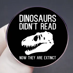 Black dinosaur skeleton pin with Dinosaurs Didn't Read Now They Are Extinct quote