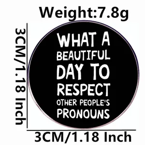 3cm round black enamel pin badge with Respect My Pronouns slogan in white text