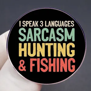 Round brooch badge featuring 'I Speak 3 Languages Sarcasm Hunting & Fishing' text