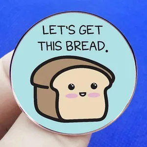 Funny cartoon bread brooch with Let's Get This Bread motivational quote on blue pin