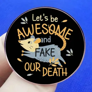 Αστεία κονκάρδα με οπόσουμ και κείμενο Let's be AWESOME and FAKE OUR DEATH σε μαύρο