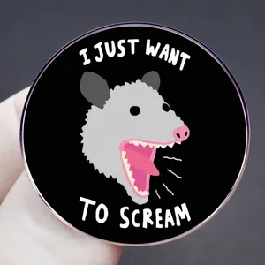 Funny screaming opossum pin badge with text I JUST WANT TO SCREAM on black background