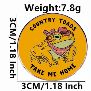 Cartoon Country Toads enamel pin with yellow frog wearing pink cowboy hat and scarf