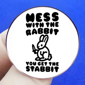 Round bunny pin badge with humor text Mess With The Rabbit You Get The Stabbit