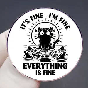 Badge chat noir entouré de requins avec slogan optimiste I'M FINE humoristique