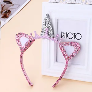 Sparkly pink unicorn headband for girls featuring silver horn, cat ears and crown
