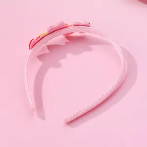 Detail of pink glitter headband for girls with plush star ornaments and non-slip inner teeth