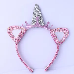 Pink unicorn headband featuring silver glitter horn, small crown, and soft cat ears