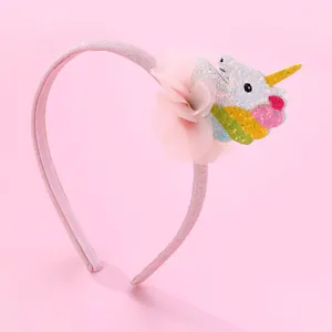 Sparkly pink unicorn headband with mesh flower and golden horn for girls hair styling