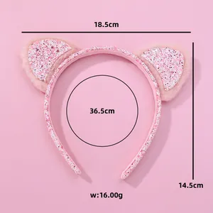 Pink sequin cat ear headband with plush details and product dimensions shown
