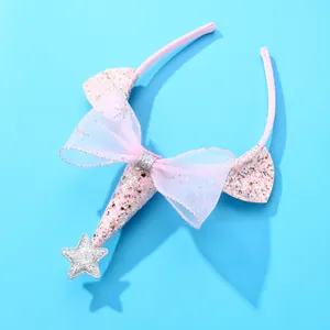 Detailed view of pink glitter unicorn horn and mesh bow headband for girls