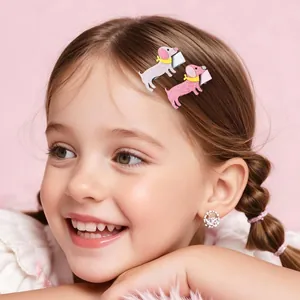 Close-up of cute glitter dachshund hair clips worn on a child for styling detail