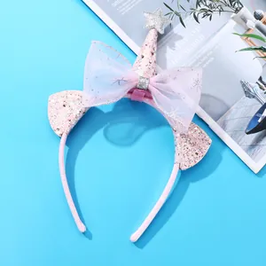 Detailed macro view of pink glitter cat ears and sequin hat on sweet kids headband