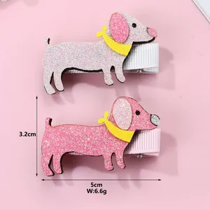 Detailed view of pink glitter dachshund dog hair clips with rib ribbon wrapped metal clips