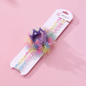 Toddler princess headband with purple glitter crown and colorful mesh tulle detail
