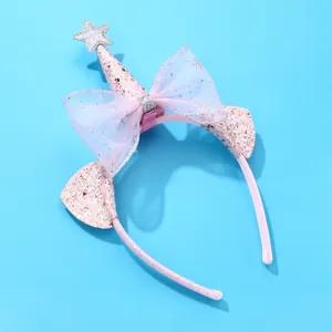 Pink girl's headband with sequined cat ears, a star cone, and a large tulle bow