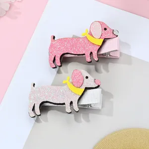 Detail of glitter sausage dog hair clips for girls with yellow scarf and ribbed fabric base