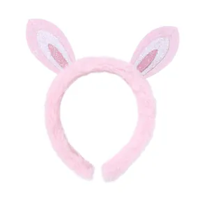 Serre-tête oreilles de lapin en peluche rose avec paillettes pour filles sur fond blanc