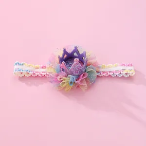 Toddler elastic headband featuring a purple sequin crown and rainbow mesh netting