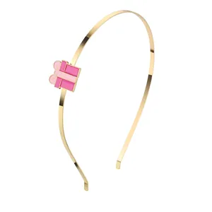 Minimalistischer goldener Haarreif mit süßem rosa Geschenkbox-Anhänger und Schleife